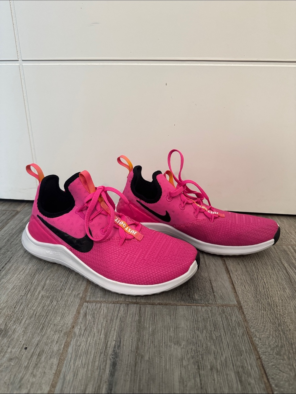 Nike Free Women's Hot Pink Athletic Sneakers with Black Swoosh 6.5